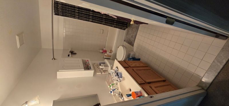 Dated basement bathroom before remodeling